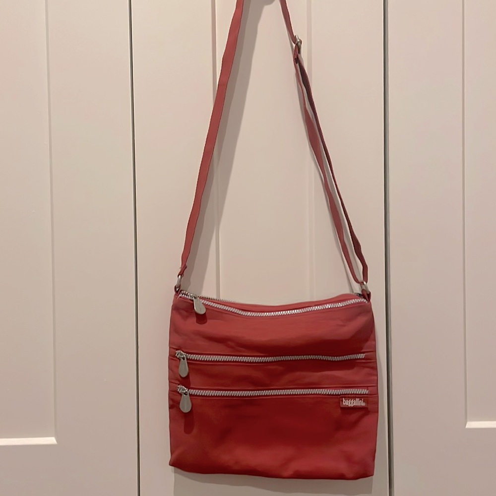 Baggallini red bag 10” x 12”.